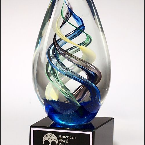 JDS 1610 -   Egg-shaped art glass award on black glass base 2-3/4 " x  7-1/8 " 1610 1610 -   Egg-shaped art glass award on black glass base 2-3/4 " x  7-1/8 " Thumbnail